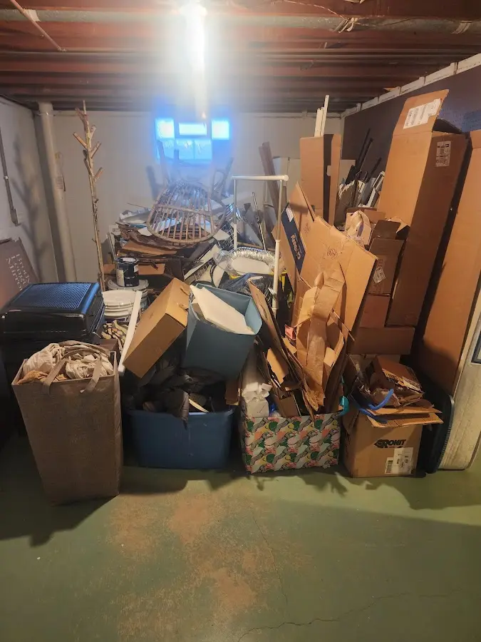 Roll-off dumpster container at job site for 20 Yard Dumpster Rental in West Samoset